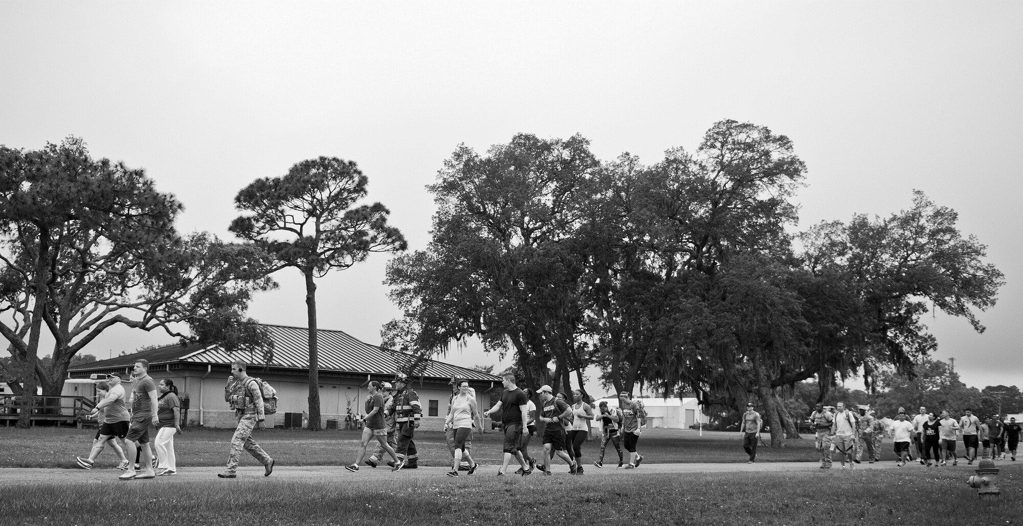Despite the rain, ruckers, runners and walkers came out to support the National Police Week 5k May 18 at Eglin Air Force Base, Fla.  (U.S. Air Force photo/Samuel King Jr.)