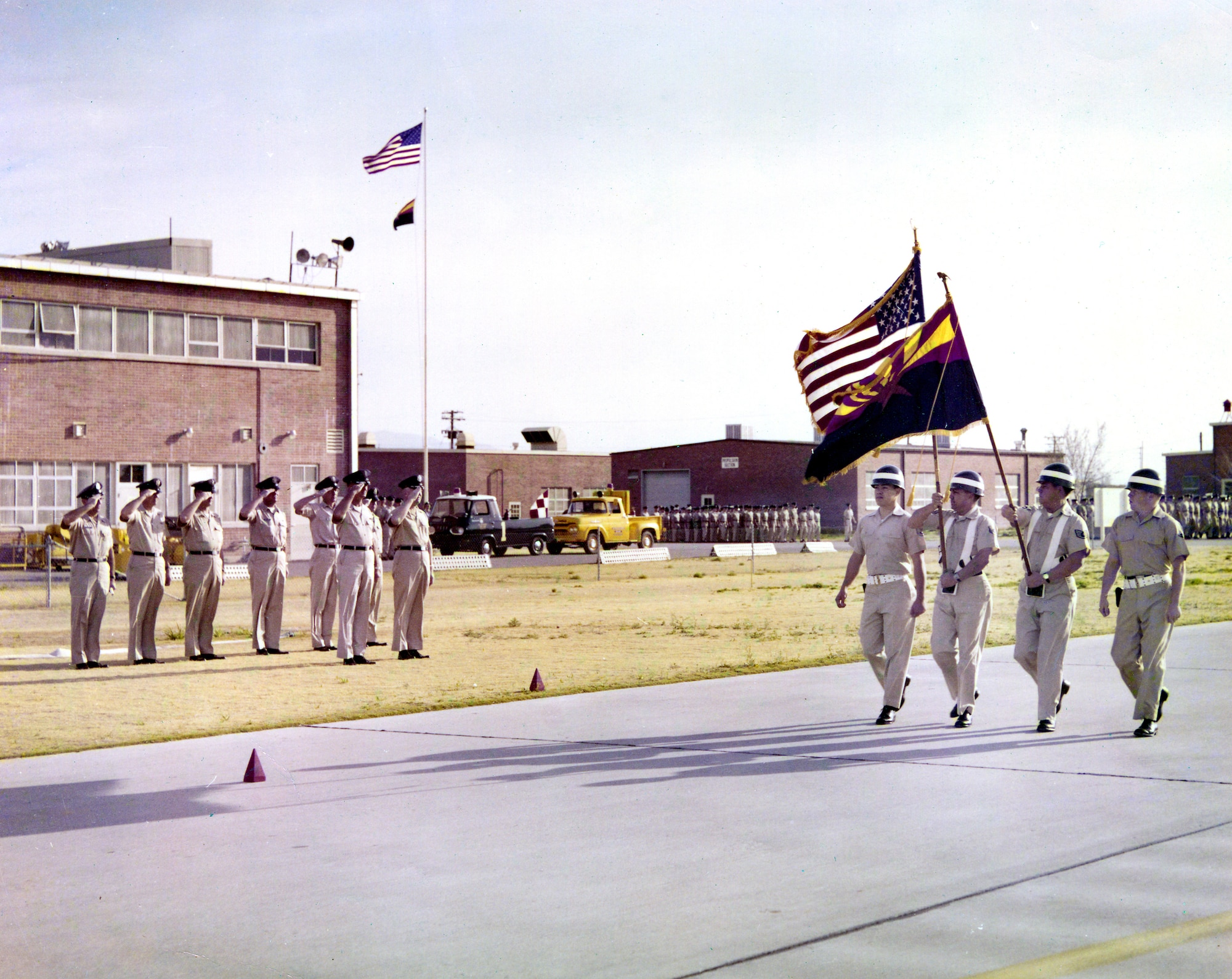 A traditional militia, the predecessor of today’s Air and Army National Guard, has a dual-mission obligation to the United States and to its respective state. In this mid-1960s photograph, the passing of colors highlights the Arizona State Flag and the American flag at what was then the 162nd Fighter Group. (U.S. Air National Guard Photo/162nd Wing Historian’s Office/Released)