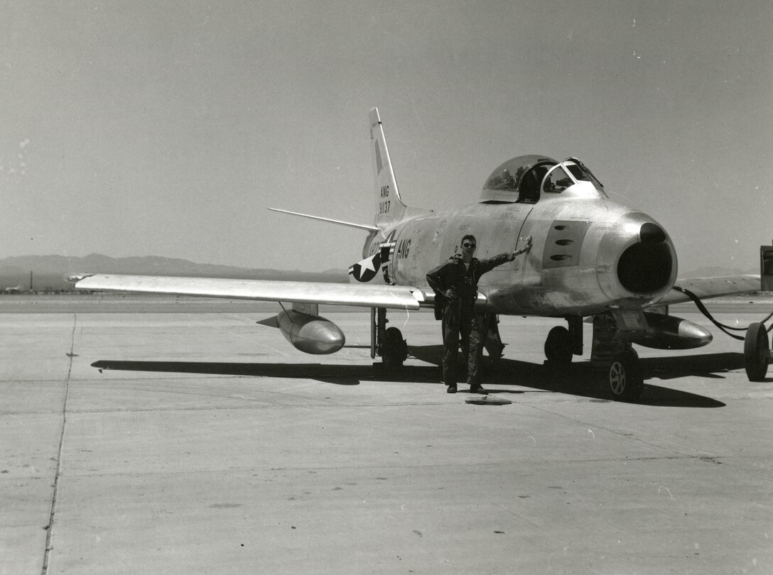 Before there were fighting falcons in the desert, there were sabres in the sky. In this photograph, taken in the late-1950s, a pilot stands by his F-86A Sabre, the first jet in what was then the 152nd Interceptor Squadron’s inventory. (U.S. Air National Guard Photo/162nd Wing Historian’s Office/Released) 