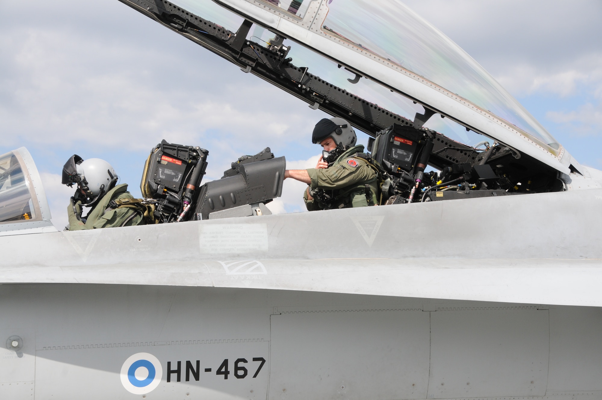 U.S. Air Force Maj. Kevin Welch, an F-15C instructor pilot from 173rd Fighter Wing, prepares to fly in the back seat of a Finnish F-18 Hornet, May 16, 2016, during a joint training exercise between the Finnish air force and the Oregon Air National Guard's 173rd Fighter Wing. The exercise fell under Operation Atlantic Resolve but differed from a normal theater security package because it was purely a training opportunity with a partner country.  (U.S. Air National Guard photo by Tech. Sgt. Jefferson Thompson/released)