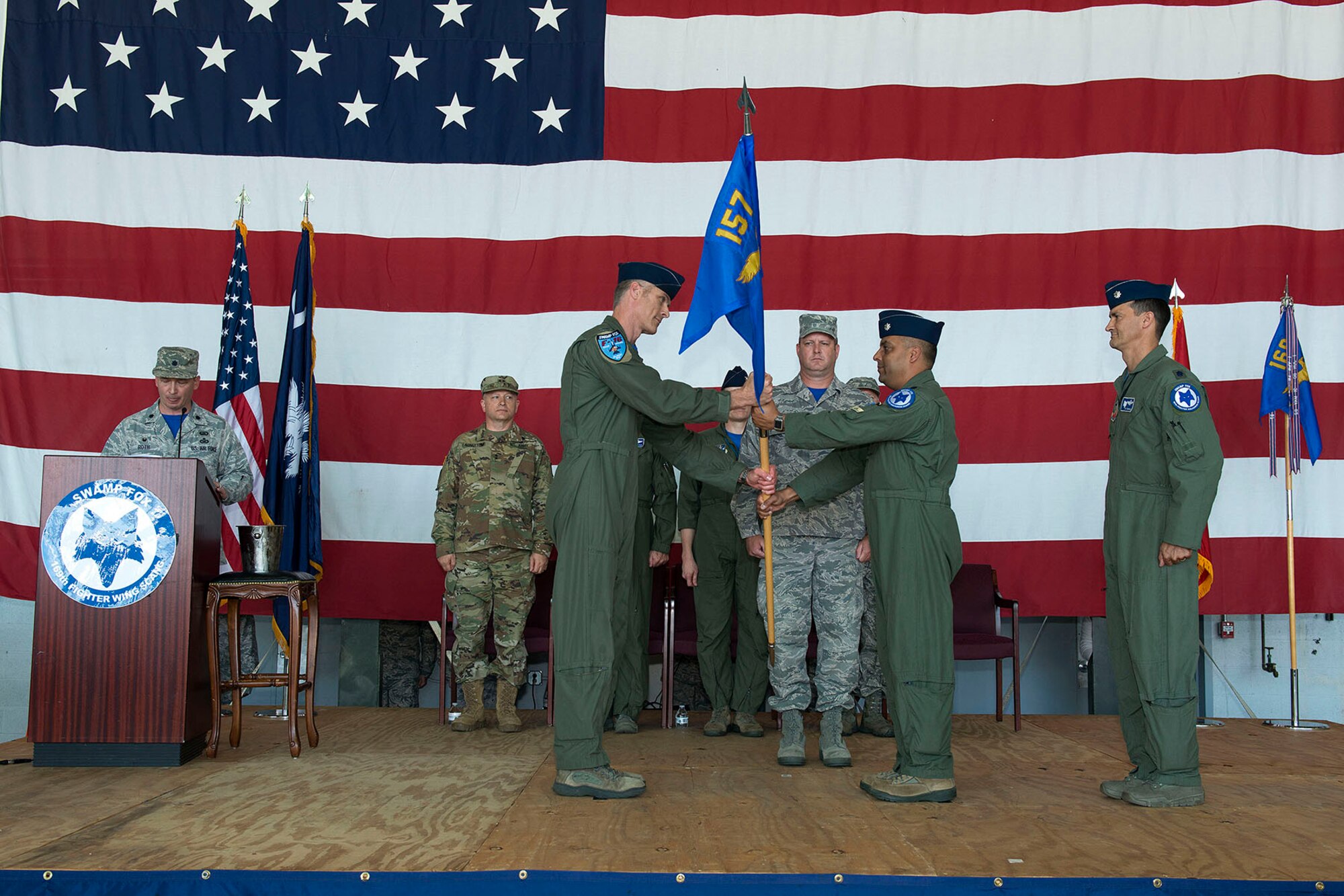 U.S. Airmen of the 169th Fighter Wing and the South Carolina Air National Guard assemble for a change of command ceremony at McEntire Joint National Guard Base, S.C., May 14, 2016. Col. David Meyer relinquishes command of the 169th Fighter Wing to Col. Nicholas Gentile and Lt. Col. Akshai Gandhi assumes the position as vice commander of the 169th Fighter Wing and relinquishes command of the 157th Fighter Squadron to Lt. Col. Brian Tenbrunsel.  (U.S. Air National Guard photo by Tech. Sgt. Jorge Intriago)