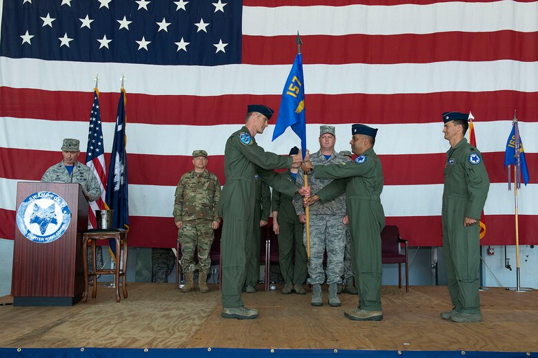 U.S. Airmen of the 169th Fighter Wing and the South Carolina Air National Guard assemble for a change of command ceremony at McEntire Joint National Guard Base, S.C., May 14, 2016. Col. David Meyer relinquishes command of the 169th Fighter Wing to Col. Nicholas Gentile and Lt. Col. Akshai Gandhi assumes the position as vice commander of the 169th Fighter Wing and relinquishes command of the 157th Fighter Squadron to Lt. Col. Brian Tenbrunsel.  (U.S. Air National Guard photo by Tech. Sgt. Jorge Intriago)