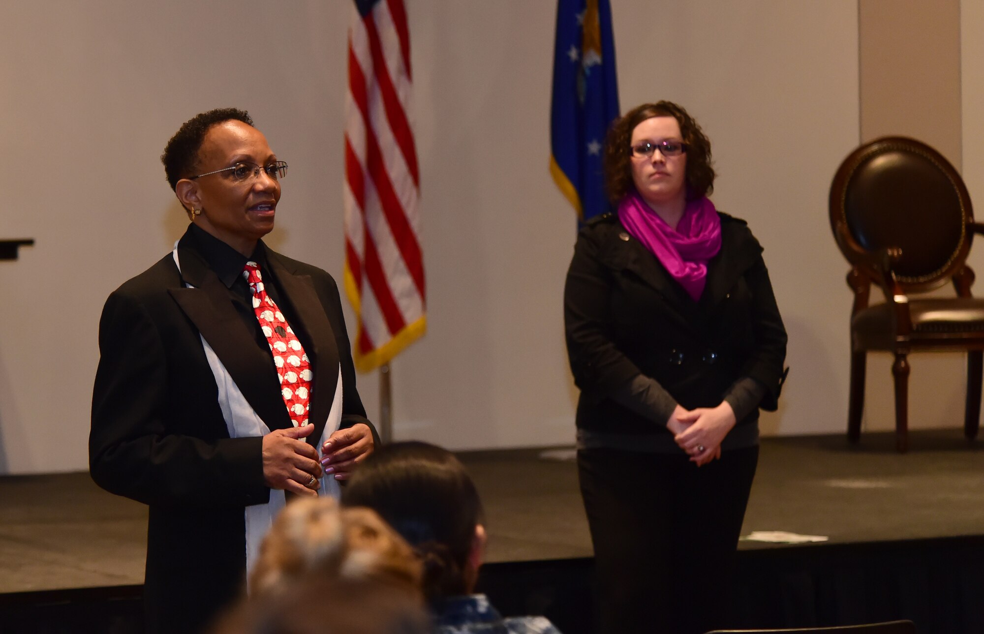 Peggie Moore-McCoy, 460th Space Wing Sexual Assault Response coordinator, addresses a crowd May 17, 2016, at the Leadership Development Center on Buckley Air Force Base, Colo. Moore-McCoy, together with Lindsy Gundrun, Senior Safe Helpline liaison, spoke on the Department of Defense Safe Helpline, a new crisis support service for members of the DoD community affected by sexual assault. (U.S. Air Force photo by Airman 1st Class Luke W. Nowakowski/Released)
 
