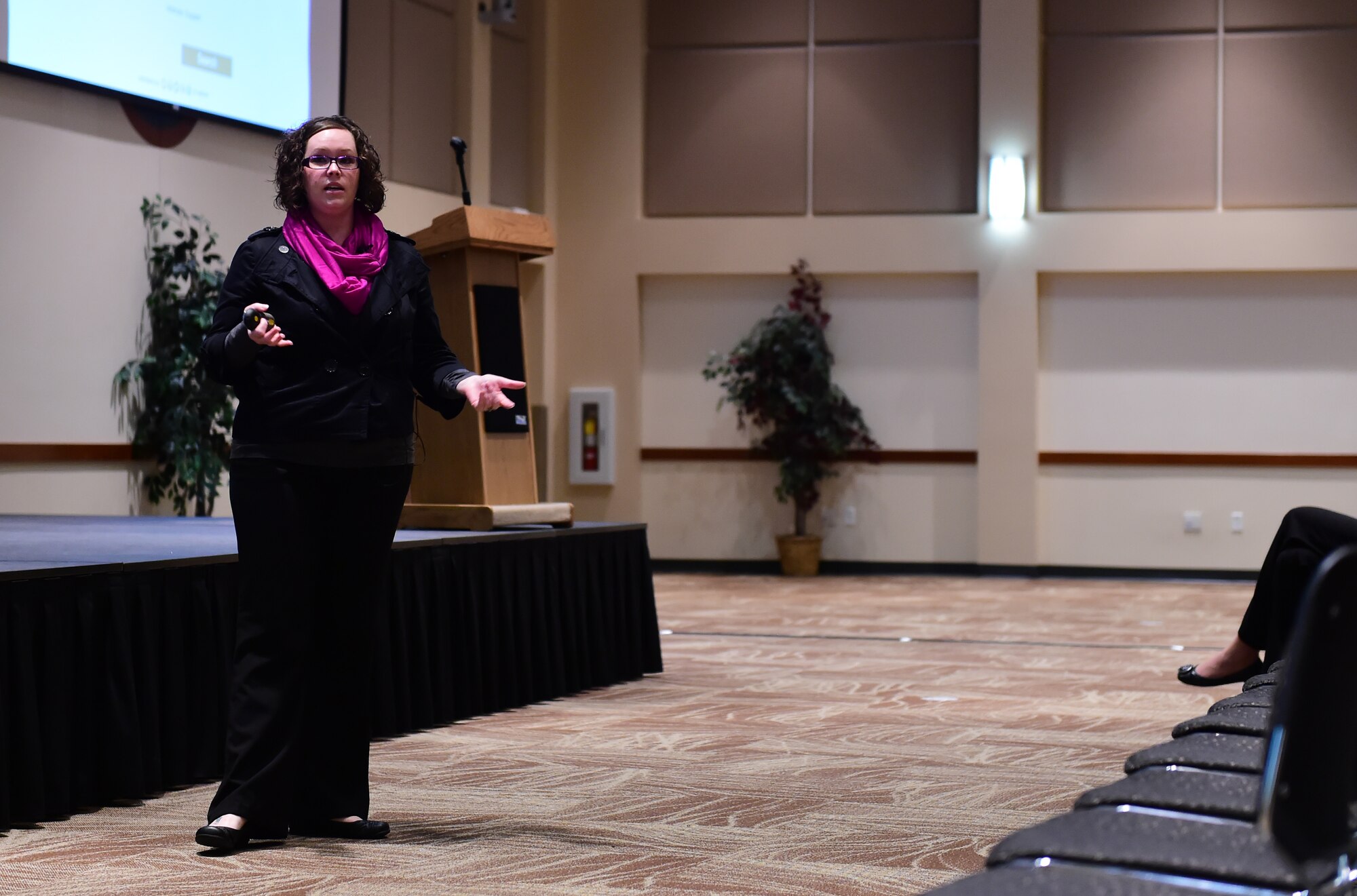 Lindsy Gundrum, Senior Safe Helpline liaison, speaks to an audience May 17, 2016, at the Leadership Development Center on Buckley Air Force Base, Colo. Her presentation highlighted the Department of Defense Safe Helpline, which helps victims of sexual assault get the help they need in a time of crisis. (U.S. Air Force photo by Airman 1st Class Luke W. Nowakowski/Released)