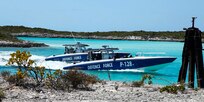 NASSAU, Bahamas (MAY 10, 2016) Members of the Royal Bahamas Defence Force exit a patrol boat during a simulated assault for Exercise Marlin Shield May 10, 2016.  Marlin Shield aims to promote interoperability between the RBDF, U.S. Northern Command and U.S. Special Operations Command North and allows both nations to practice combating terrorism and illicit trafficking in the Caribbean region.