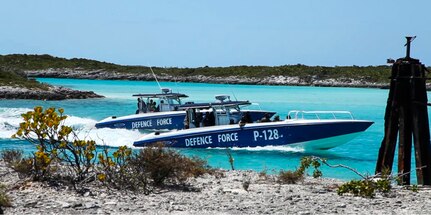 NASSAU, Bahamas (MAY 10, 2016) Members of the Royal Bahamas Defence Force exit a patrol boat during a simulated assault for Exercise Marlin Shield May 10, 2016.  Marlin Shield aims to promote interoperability between the RBDF, U.S. Northern Command and U.S. Special Operations Command North and allows both nations to practice combating terrorism and illicit trafficking in the Caribbean region.