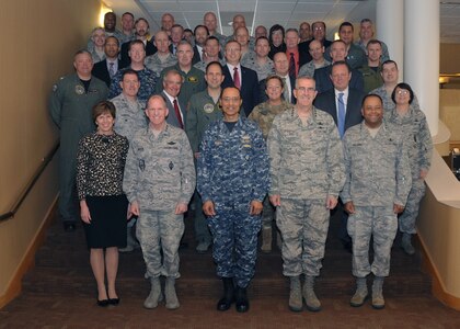 Front row: U.S. Navy Adm. Cecil D. Haney, U.S. Strategic Command (USSTRATCOM) commander (center); U.S. Air Force Gen. John E. Hyten, Air Force Space Command commander (second from right); U.S. Air Force Lt. Gen. Stephen W. Wilson, USSTRATCOM deputy commander (second from left); U.S. Air Force Lt. Gen. Samuel A. Greaves, Space and Missile Systems Center commander (right); and Ms. Kerry E. Kelley, USSTRATCOM command, control, communications, and computer systems director; and other leaders pose for a photo as part of an Integrated Tactical Warning and Attack Assessment (ITWAA) stakeholder's meeting, Offutt Air Force Base, Neb., May 18, 2016. During the meeting, Haney met with Department of Defense and service leaders to discuss issues related to ITWAA in order to maintain, sustain and modernize the ITWAA architecture. USSTRATCOM leadership chairs stakeholder forums such as these to assess the health and direction of the nation's strategic forces, including bomber, intercontinental ballistic missile and submarine forces, as well as the communication networks and sensors that tie them all together. One of nine DoD unified combatant commands, USSTRATCOM has global strategic missions, assigned through the Unified Command Plan, which include strategic deterrence; space operations; cyberspace operations; joint electronic warfare; global strike; missile defense; intelligence, surveillance and reconnaissance; combating weapons of mass destruction; and analysis and targeting. (USSTRATCOM photo by Steve Cunningham)