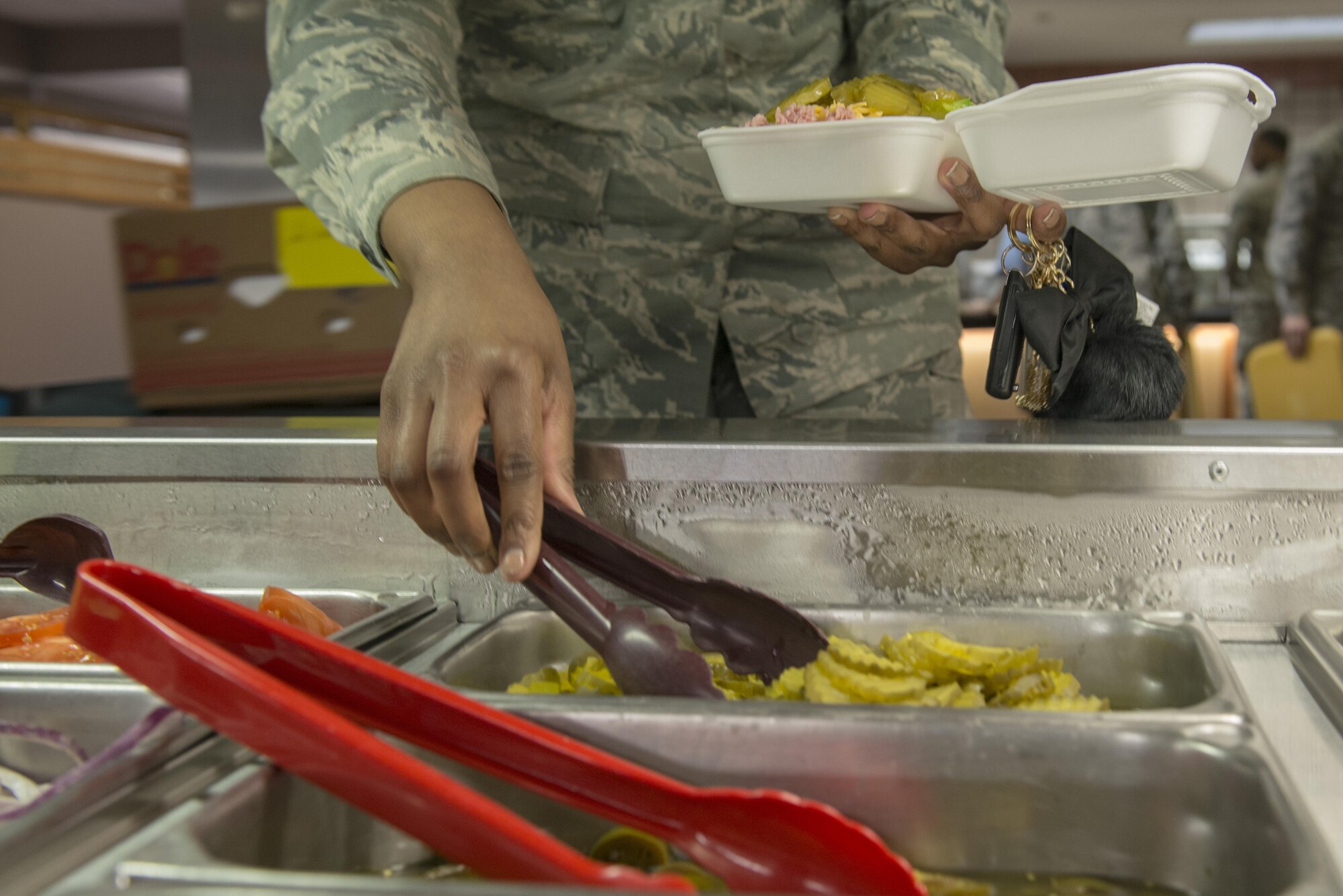 The salad bar is one of the many healthy options available during the lunch rush May 11, 2016, in the Two Seasons Dining Facility, Eielson Air Force Base, Alaska. The 14-day food menu was accommodated to allow members of the Indian Air Force to eat their usual cuisine. (U.S. Air Force photo by Staff Sgt. Ashley Nicole Taylor/Released) 