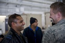 U.S. Air Force Chaplain (Capt) Philip Vincent, a 354th Fighter Wing chaplain, shares a laugh with a member of the Indian Air Force (IAF), May 9, 2016, on Eielson Air Force Base, Alaska. The IAF participated in RED FLAG-Alaska for the first time to trade best practices and strengthen the relationship between U.S. forces and the IAF. (U.S. Air Force Photo by 1Lt Elias Zani/Released)