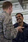 U.S. Air Force Chaplain (Capt) Philip Vincent, left, a 354th Fighter Wing chaplain, shares his experiences with an Indian Air Force Airman, May 9, 2016, on Eielson Air Force Base, Alaska. During higher-than-normal operational tempos, the Air Force Chaplain Corps understand that it can be difficult for individuals to step away from the mission and therefore come to work centers to directly provide spiritual and pastoral care. (U.S. Air Force Photo by 1Lt Elias Zani/Released)