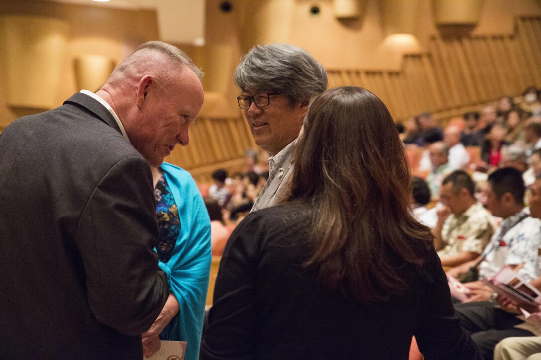 CAMP HANSEN, Okinawa, Japan – III Marine Expeditionary Force Commander Lt. Gen. Lawrence Nicholson greets Ministry of Foreign Affairs Ambassador Masashi Mizukami at the III MEF Band Spring Concert May 7, 2016 at Tedako Hall, Okinawa, Japan. The III MEF Band is the only expeditionary force band in the Marine Corps, and performs in over 300 events each year, including the Japan Self-Defense Force Marching Festival, the Cherry Blossom Festival and the Okinawa City Street Parade. (U.S. Marine Corps photo by Cpl. Tiffany Edwards)