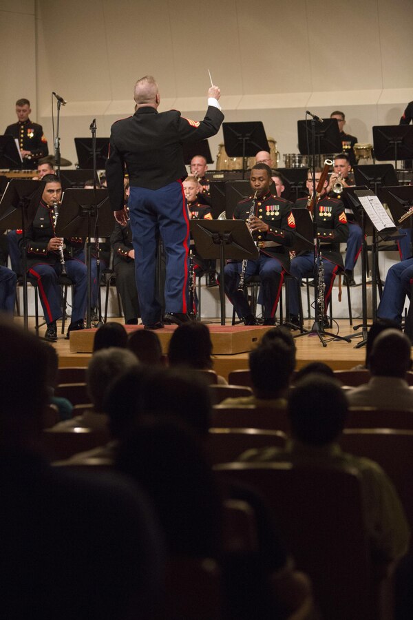 CAMP HANSEN, Okinawa, Japan – The III Marine Expeditionary Force Band performed a tribute dedicated to the victims of the 2011 great East Japan earthquake and the victims in the recent earthquake in Kumamoto at their Spring Concert May 7, 2016 at Tedako Hall, Okinawa, Japan. III MEF Commander Lt. Gen. Lawrence Nicholson, Ginowan City Mayor Atsushi Sakima, Ministry of Foreign Affairs Ambassador Masashi Mizukami and many other distinguished visitors attended the concert. The III MEF Band is comprised of 50 Marines, and performs in over 300 events each year, including the Japan Self-Defense Force Marching Festival, the Cherry Blossom Festival and the Okinawa City Street Parade. (U.S. Marine Corps photo by Cpl. Tiffany Edwards)