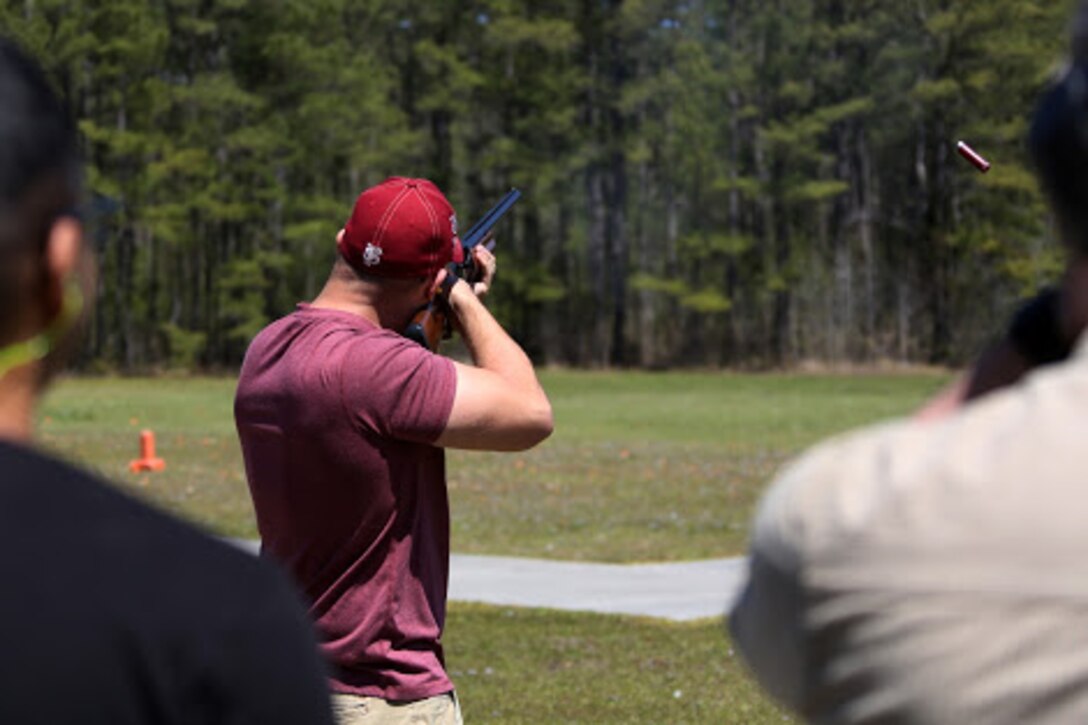 Lance Cpl. David Simmons fires a shotgun during a trap and skeet range at Marine Corps Air Station Cherry Point, N.C., April 14, 2016. Twenty Marines with 2nd Low Altitude Air Defense Battalion’s Firearms Mentorship Program utilized their marksmanship skills during the range as part of their firearms safety classes. The mentorship program promotes safe private gun ownership, builds confidence in marksmanship skills and increases Marines combat readiness by familiarizing them with other weapons.  Simmons is an assistant low altitude air defense gunner with the battalion. (U.S. Marine Corps photo by Cpl. N.W. Huertas/ Released)