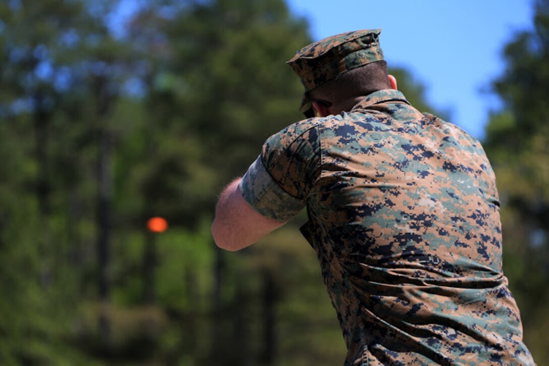 Cpl. Robert Schmitt sights in on a target during a trap and skeet range at Marine Corps Air Station Cherry Point, N.C., April 14, 2016. Twenty Marines with 2nd Low Altitude Air Defense Battalion’s Firearms Mentorship Program utilized their marksmanship skills during the range as part of their firearms safety classes. The mentorship program promotes safe private gun ownership, builds confidence in marksmanship skills and increases Marines combat readiness by familiarizing them with other weapons. Schmitt is a low altitude air defense gunner with the battalion. (U.S. Marine Corps photo by Cpl. N.W. Huertas/ Released)