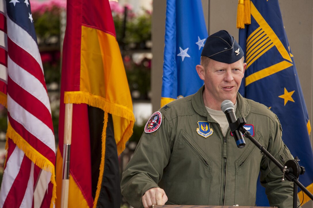 U.S. Air Force Col. Joseph McFall, 52nd Fighter Wing commander speaks, during the grand opening ceremony of the new commissary May 19, 2016, at Spangdahlem Air Base, Germany. The facility is part of the Spangdahlem Evolution, a building plan that includes the Medical Group and the future Spangdahlem Middle School and High School. (U.S. Air Force photo by Senior Airman Rusty Frank/Released)