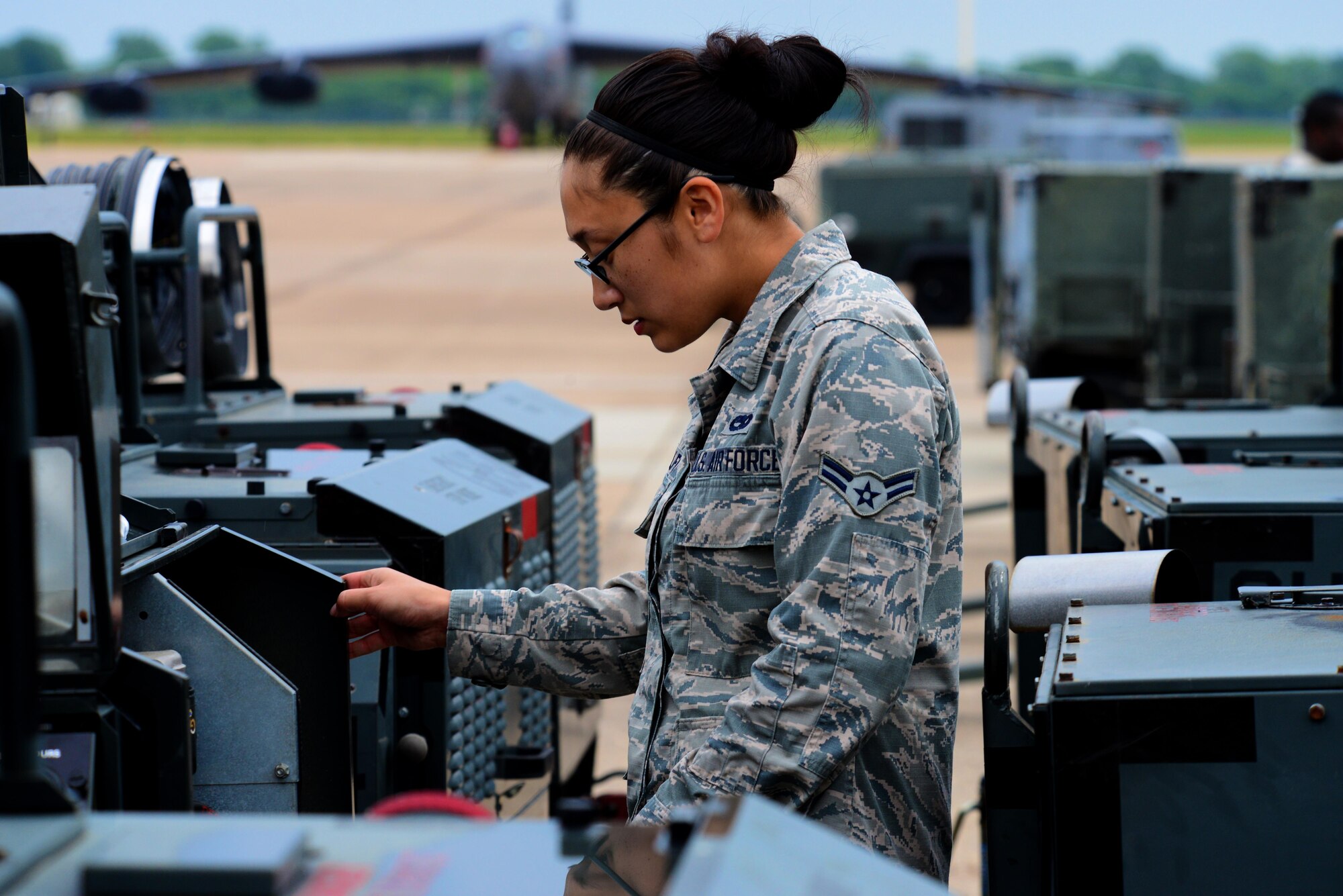 Airman 1st Class Rhiannon Landolfi, 2nd Maintenance Squadron aerospace ground equipment maintainer, inspects a gas-powered light at Barksdale Air Force Base, La., May 16, 2016. Gas-powered lights are essential when maintenance needs to be performed at night or during an emergency situation like a power outage. (U.S. Air Force photo/Senior Airman Luke Hill)