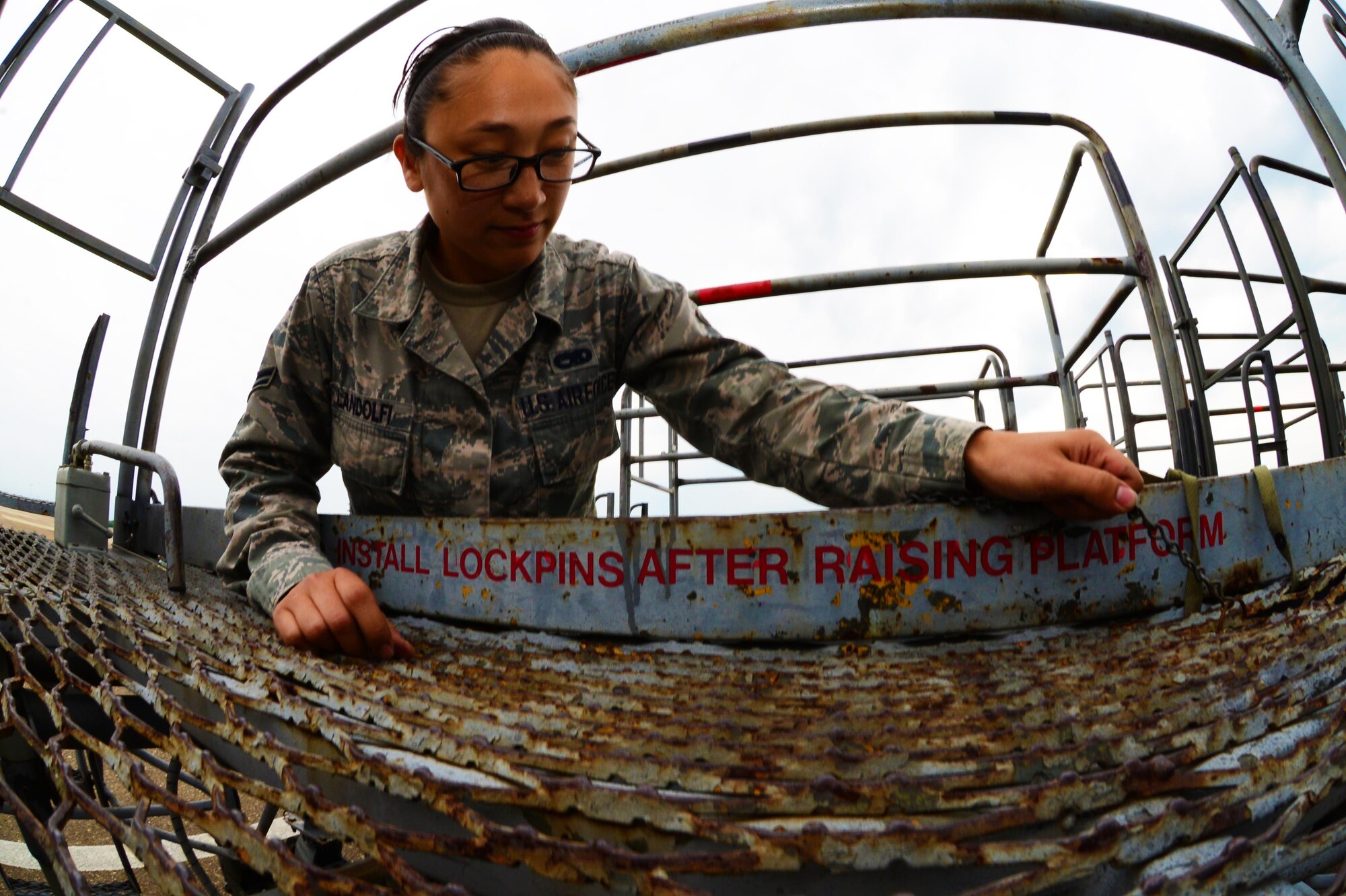 Airman 1st Class Rhiannon Landolfi, 2nd Maintenance Squadron aerospace ground equipment maintainer inspects a scaffold at Barksdale Air Force Base, La., May 16, 2016. The responsibilities of AGE Airmen include inspections and upkeep of more than 600 pieces of AGE equipment. Preventative maintenance ensures equipment lasts longer and is safe for users and machines alike. (U.S. Air Force photo/Senior Airman Luke Hill)  