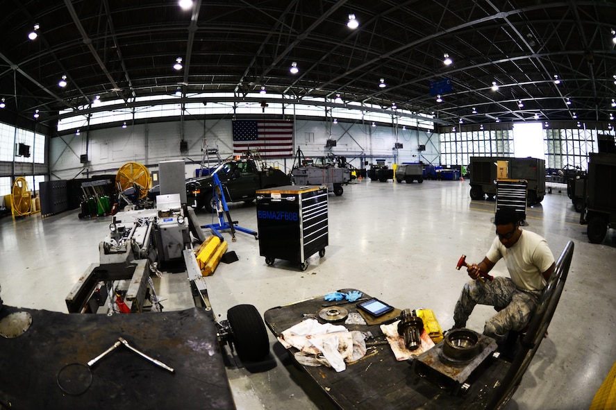 Senior Airman Dawuud Gibson, 2nd Maintenance Squadron aerospace ground equipment maintainer, conducts maintenance on a bomb lift table at Barksdale Air Force Base, La., May 16, 2016. Instead of directly maintaining the B-52 Stratofortress, AGE Airmen maintain equipment such as bomb lifts, scaffolds and equipment used by other maintainers. (U.S. Air Force photo/Senior Airman Luke Hill)