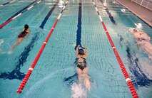 Airmen perform the swimming portion of the Michael Hill Memorial Triathlon at Ramstein Air Base, Germany, May 14, 2016. More than 40 competitors participated in the super sprint triathlon that included three portions; 275m swim, 20 km bike and 5 km run. (U.S. Air Force photo by/Tech Sgt. Sara Keller)