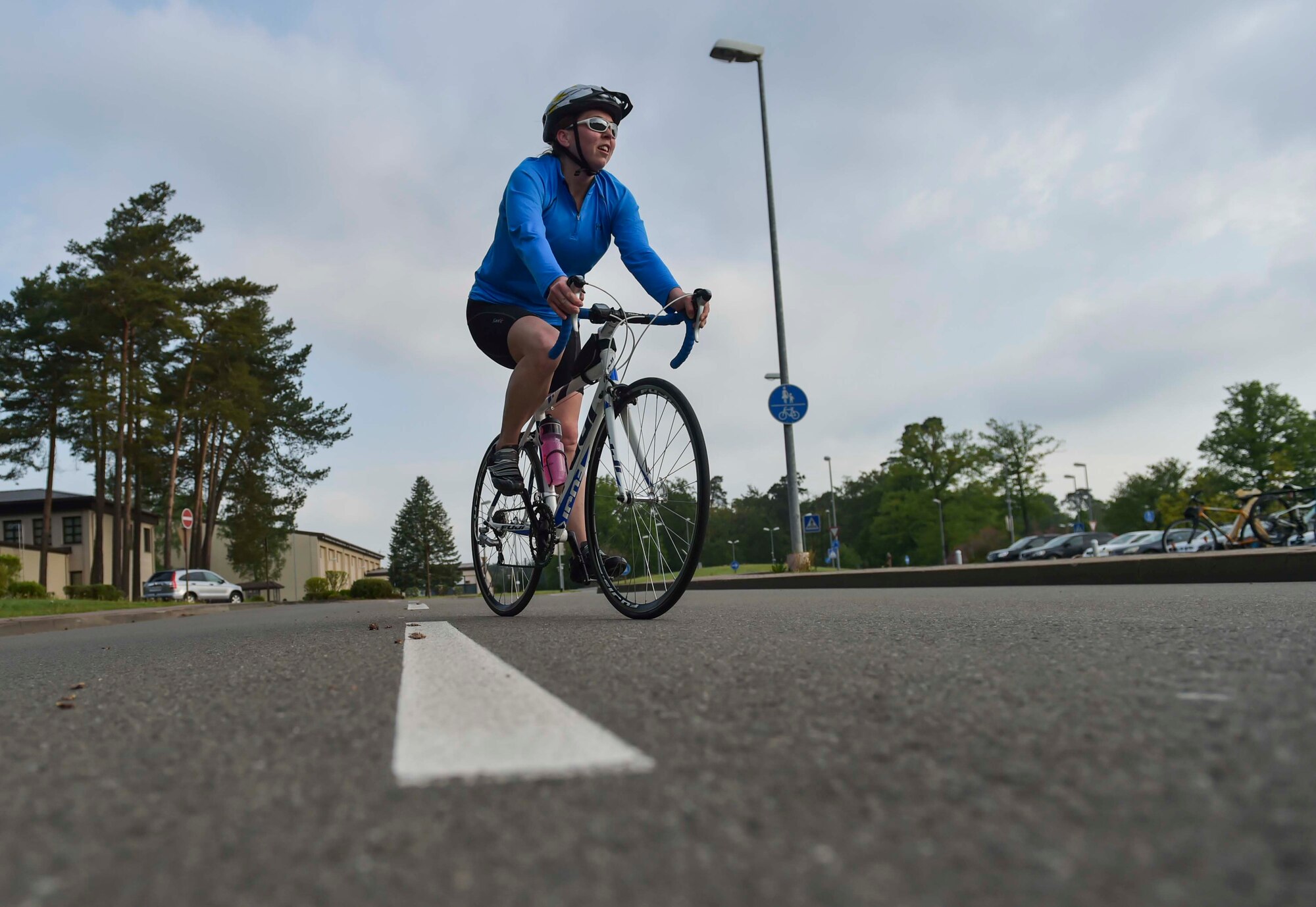A Ramstein member compete in the bike portion of the Michael Hill Memorial Triathlon at Ramstein Air Base, Germany, May 14, 2016. The triathlon was held in memory of Airman 1st Class Michael Hill who was assigned to the 786th Civil Engineer Squadron as a heavy equipment operator before suddenly losing his life nearly one year ago in a fatal car accident. (U.S. Air Force photo by/Tech Sgt. Sara Keller)