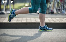 An athlete competes in the run portion of the Michael Hill Memorial Triathlon at Ramstein Air Base, Germany, May 14, 2016. The triathlon was held in memory of Airman 1st Class Michael Hill who was assigned to the 786th Civil Engineer Squadron as a heavy equipment operator before suddenly losing his life nearly one year ago in a fatal car accident. The triathlon included three portions; 275 m swim, 20 km bike and 5 km run. All proceeds collected for the event were donated to a charity in Michael Hill’s name. (U.S. Air Force photo by/Tech Sgt. Sara Keller)