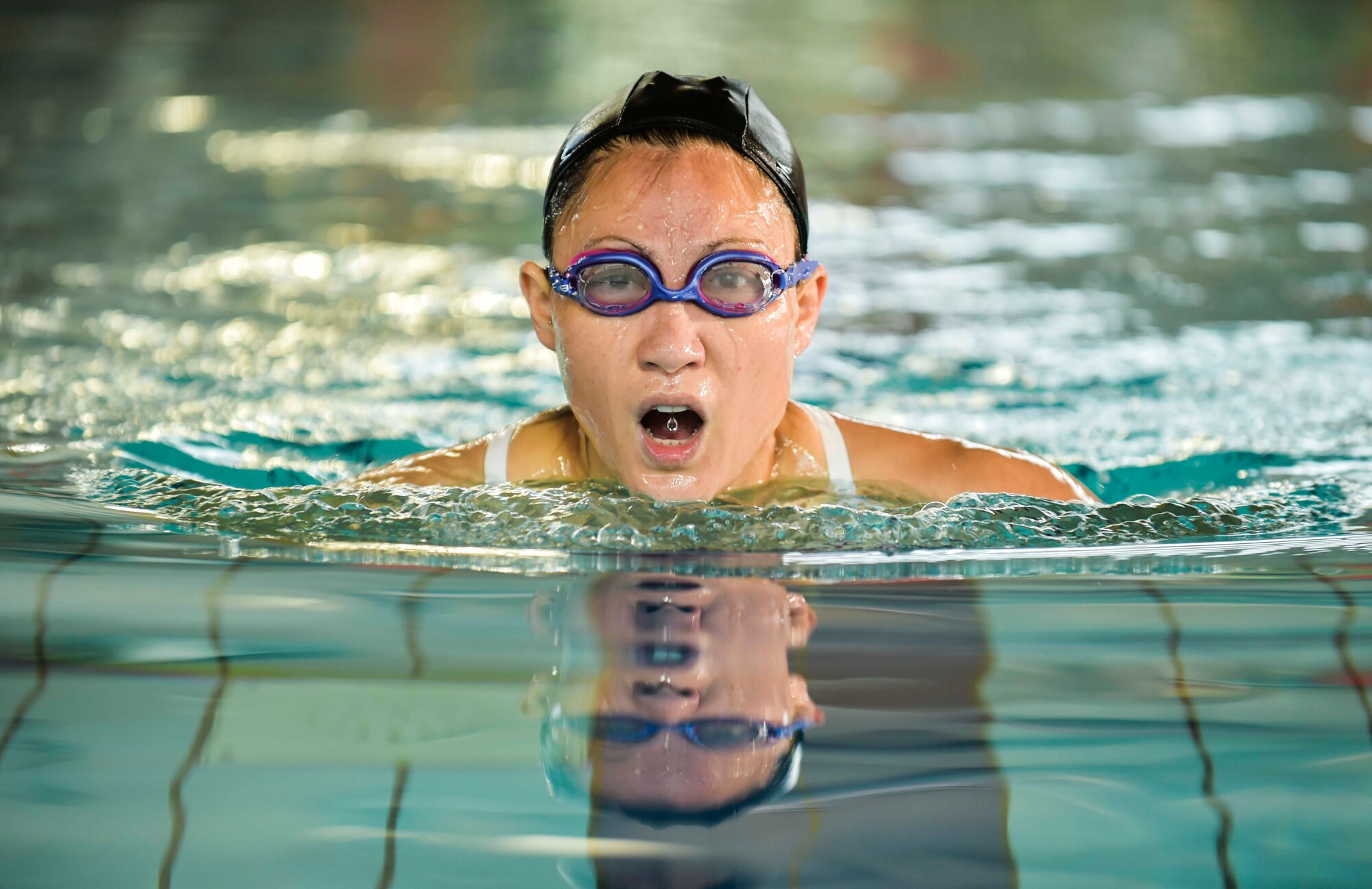 An Airman competes in the swimming portion of the Michael Hill Memorial Triathlon at Ramstein Air Base, Germany, May 14, 2016. More than 40 competitors participated in the super sprint triathlon that included three portions; 275 m swim, 20 km bike and 5 km run. (U.S. Air Force photo by/Tech. Sgt. Sara Keller)