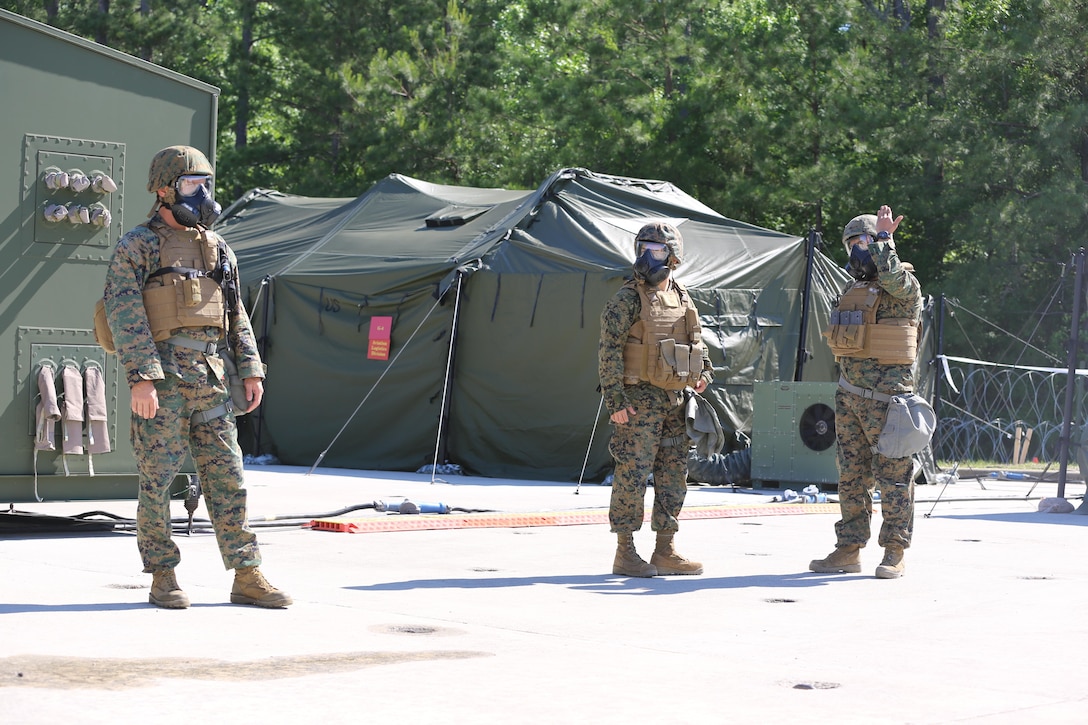 Marines participate in a chemical, biological, radiological and nuclear defense drill during 2nd Marine Aircraft Wing’s portion of the II Marine Expeditionary Force Exercise 2016 at Marine Corps Air Station Cherry Point, N.C., May 15, 2016. The purpose of the drill was to ensure that the Marines know how to react quickly and use their equipment properly. MEFEX 16 is designed to synchronize and bring to bear the full spectrum of II MEF’s command and control capabilities in support of the Marine Air-Ground Task Force. (U.S. Marine Corps photo by Staff Sgt. Rebekka S. Heite/Released)