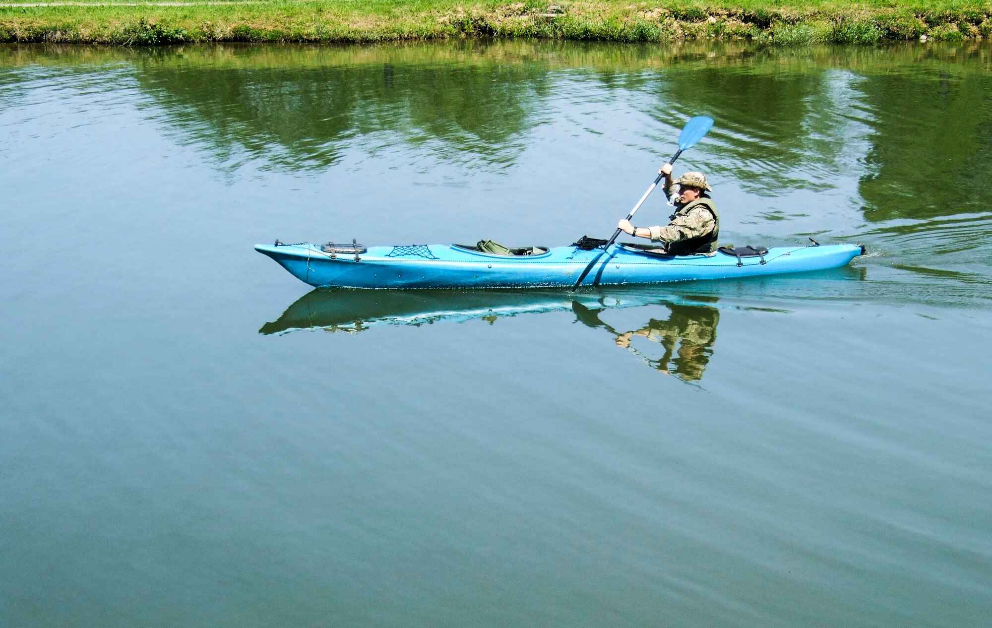 Senior Airman Tormod Lillekroken, 2nd Air Support Operations Squadron joint terminal attack controller, completes the kayaking challenge as part of one of the challenges during the Croatian Best Soldier Competition in Grubišno Polje, Croatia, May 12, 2016. Nine U.S. service members, including five Airmen were among the first U.S. service members to ever complete the multi-day challenge that included 28 check points and 12 work stations that challenged competitors in the shooting, medical care, kayaking, weapons assembly and more. (Courtesy photo) 