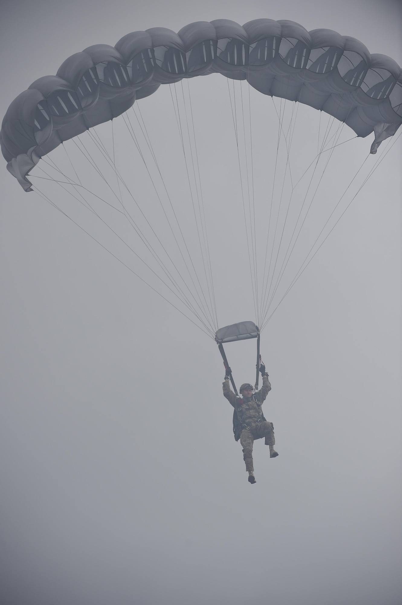 Chief Master Sgt. Bruce W. Dixon, the command chief master sergeant of the 24th Special Operations Wing, conducts his final military jump at Hurlburt Field, Fla., May 3, 2016. Dixon, who is retiring after a 30-year career as a combat controller, is one of a handful of military members to complete three free-fall jumps into combat since the Vietnam War. (U.S. Air Force photo by Airman 1st Class Kai White) 