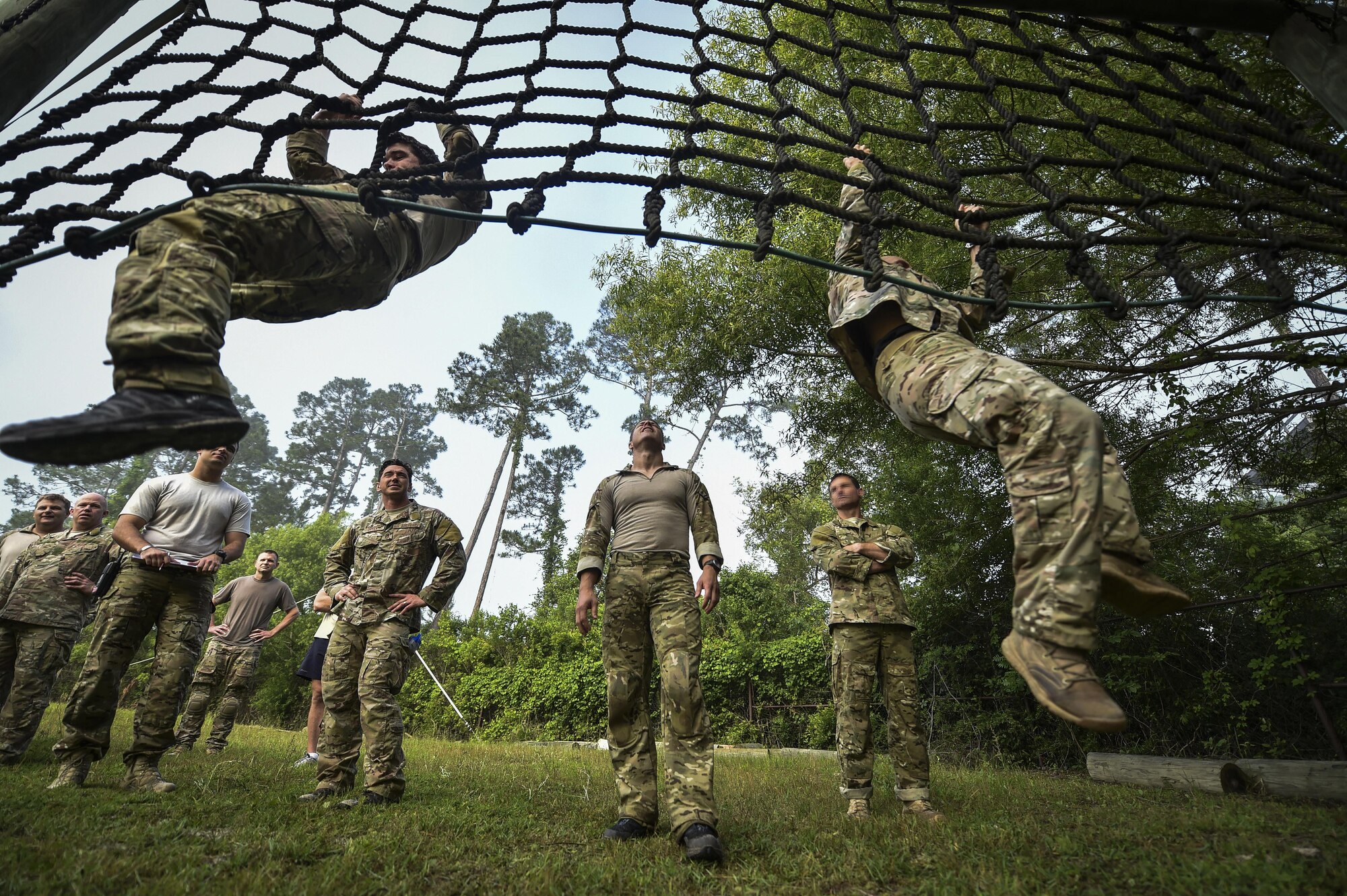 Monster Mash Team 2, begins an obstacle course during a Monster Mash, at Hurlburt Field, Fla., May 12, 2016. Monster Mash is a long-standing Special Tactics training tradition, consisting of an obstacle course where special operators complete timed scenarios at different stations of core mission training. The event was held in honor of Chief Master Sgt. Bruce W. Dixon, the command chief of the 24th Special Operations Wing, who is retiring after a 30-year career as a combat controller. (U.S. Air Force photo by Senior Airman Ryan Conroy)   