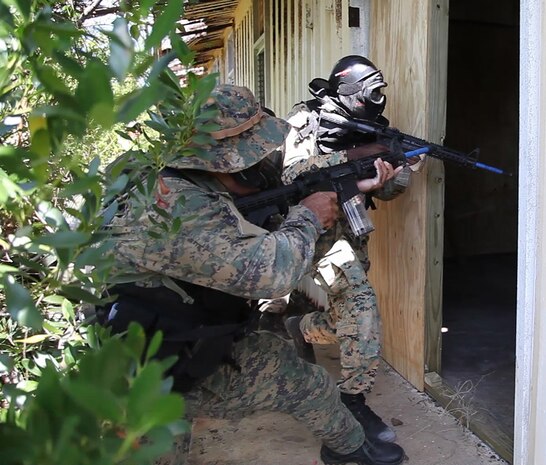 Royal Bahama Defence Force Commandos breach a room as part of a simulated interdiction exercise during Marlin Shield on Pike Cay, Bahamas May 10, 2016. Marlin Shield promotes interoperability between the RBDF, U.S. Northern Command, and U.S. Special Operations Command North and allows both nations to combat terrorism and illicit trafficking in the Caribbean region.