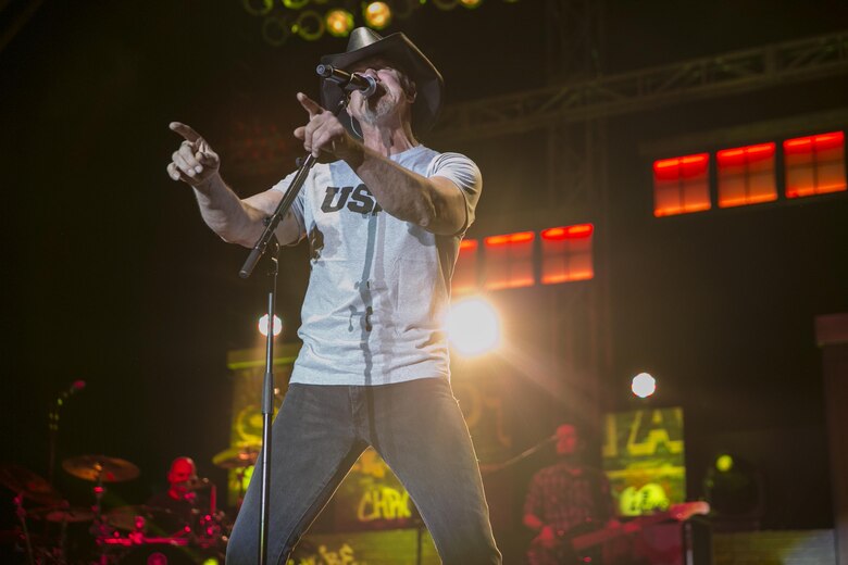 Trace Adkins performs his hit song “Semper Fi” for Combat Center patrons during the We Salute You Celebration at Lance Cpl. Torrey L. Gray Field May 7, 2016. Marine Corps Community Services hosted the event to provide local entertainment to Marines and sailors aboard the Combat Center. (Official Marine Corps photo by Lance Cpl. Dave Flores/Released)