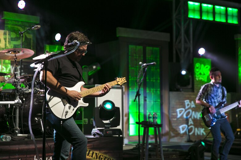 Mark Gillespie, guitarist for Trace Adkins, performs for Combat Center patrons during the We Salute You Celebration at Lance Cpl. Torrey L. Gray Field May 7, 2016. Marine Corps Community Services hosted the event to provide local entertainment to Marines and sailors aboard the Combat Center. (Official Marine Corps photo by Lance Cpl. Dave Flores/Released)