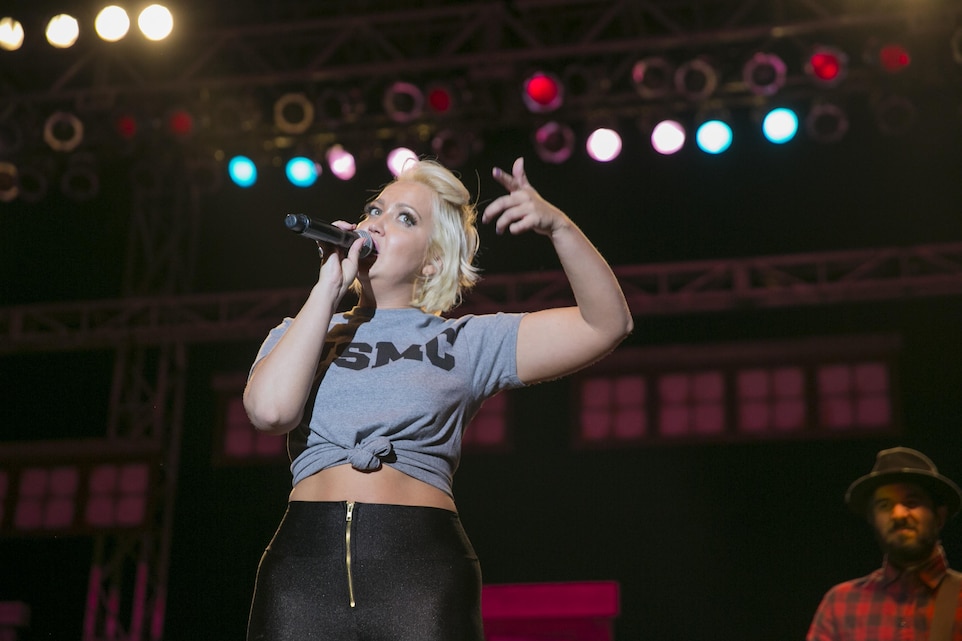 Meghan Linsey performs her final song for Combat Center patrons during the We Salute You Celebration at Lance Cpl. Torrey L. Gray Field May 7, 2016. Marine Corps Community Services hosted the event to provide local entertainment to Marines and sailors aboard the Combat Center. (Official Marine Corps photo by Lance Cpl. Dave Flores/Released)