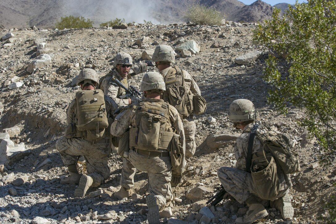 Cpl. John C. Fisher, squad leader, 2nd Battalion, 8th Marine Regiment, leads his Marines through Range 410 while participating in Integrated Training Exercise 3-16 aboard the Marine Corps Air Ground Combat Center, Twentynine Palms, Calif., May 9, 2016. 2/8 came from Marine Corps Base Camp Lejeune, N.C., to participate in ITX 3-16. (Official Marine Corps photo by Lance Cpl. Dave Flores/Released)