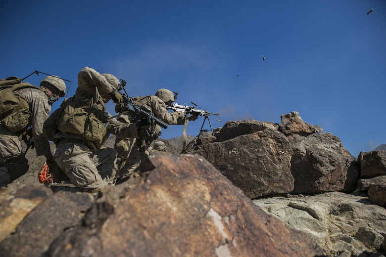 Marines with 2nd Battalion, 8th Marine Regiment, lay down suppressive fire at Range 410 while participating in Integrated Training Exercise 3-16 aboard Marine Corps Air Ground Combat Center, Twentynine Palms, Calif., May 9, 2016. 2/8 came from Marine Corps Base Camp Lejeune, N.C., to participate in ITX 3-16. (Official Marine Corps photo by Lance Cpl. Dave Flores/Released)