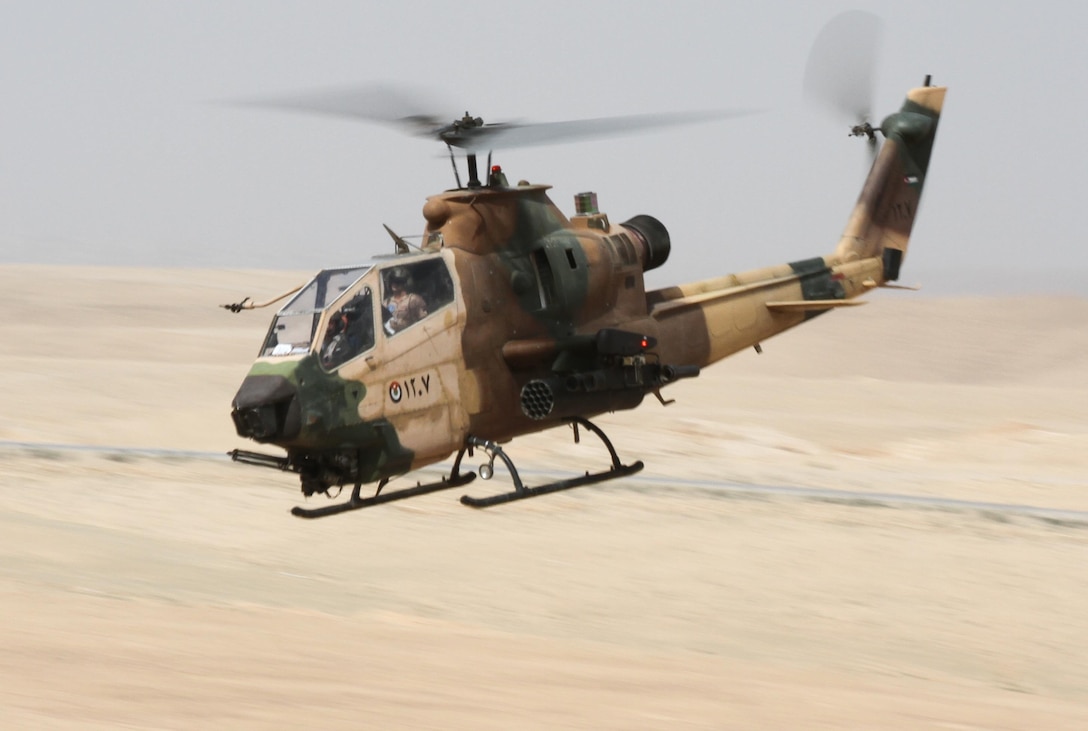 A Jordanian Cobra Helicopter flys toward the target zone during a Quick Reaction Force Training drill during Exercise Eager Lion 2016 near Amman, Jordan, 18 May, 2016. Eager Lion 16 is a bi-lateral exercise in the Hashemite Kingdom of Jordan between the JAF and the U.S. Military designed to strengthen relationships and interoperability between partner nations. (U.S. Army Reserve photo by Spc. Ian Valley 366 Mobile Public Affairs Detachment.)