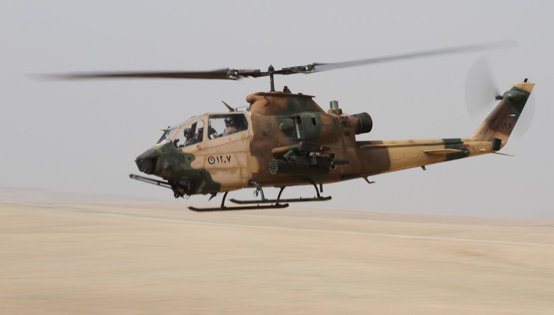 A Jordanian Cobra Helicopter flys toward the target zone during a Quick Reaction Force Training drill during Exercise Eager Lion 2016 near Amman, Jordan, 18 May, 2016. Eager Lion 16 is a bi-lateral exercise in the Hashemite Kingdom of Jordan between the JAF and the U.S. Military designed to strengthen relationships and interoperability between partner nations. (U.S. Army Reserve photo by Spc. Ian Valley 366 Mobile Public Affairs Detachment.)