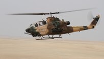 A Jordanian Cobra Helicopter flys toward the target zone during a Quick Reaction Force Training drill during Exercise Eager Lion 2016 near Amman, Jordan, 18 May, 2016. Eager Lion 16 is a bi-lateral exercise in the Hashemite Kingdom of Jordan between the JAF and the U.S. Military designed to strengthen relationships and interoperability between partner nations. (U.S. Army Reserve photo by Spc. Ian Valley 366 Mobile Public Affairs Detachment.)