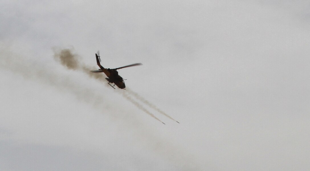 A Jordanian Cobra Helicoptor engages a target with missles during a Quick Reaction Force drill during Exercise Eager Lion 2016 near Amman, Jordan, 18 May, 2016. Eager Lion 16 is a bi-lateral exercise in the Hashemite Kingdom of Jordan between the JAF and the U.S. Military designed to strengthen relationships and interoperability between partner nations. (U.S. Army Reserve photo by Spc. Ian Valley 366 Mobile Public Affairs Detachment.)