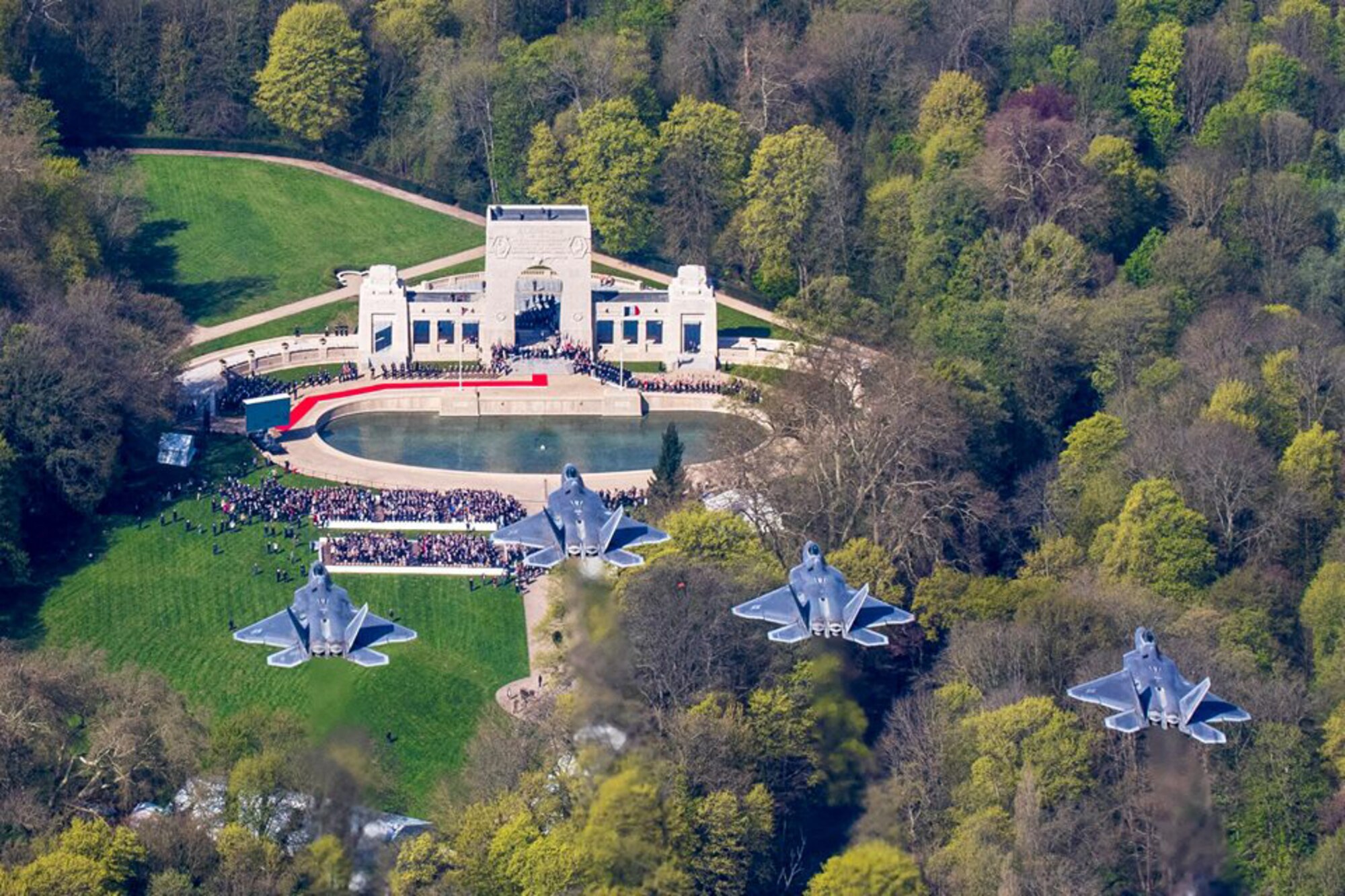 Pilots from the 95th and 301st Fighter Squadrons from Tyndall Air Force Base, Fla., fly over the Lafayette Escadrille Memorial, France, for a ceremony April 20. The ceremony celebrated the centennial of the Layfayette Escadrille, which was comprised of American volunteer pilots who flew with the French military before and after the United States entered World War I. The monument honors the service of these pilots and serves as the final resting place for some. The 301 FS is a unit under the 44th Fighter Group, which is a classic associate unit at Tyndall. (Courtesy photo)  