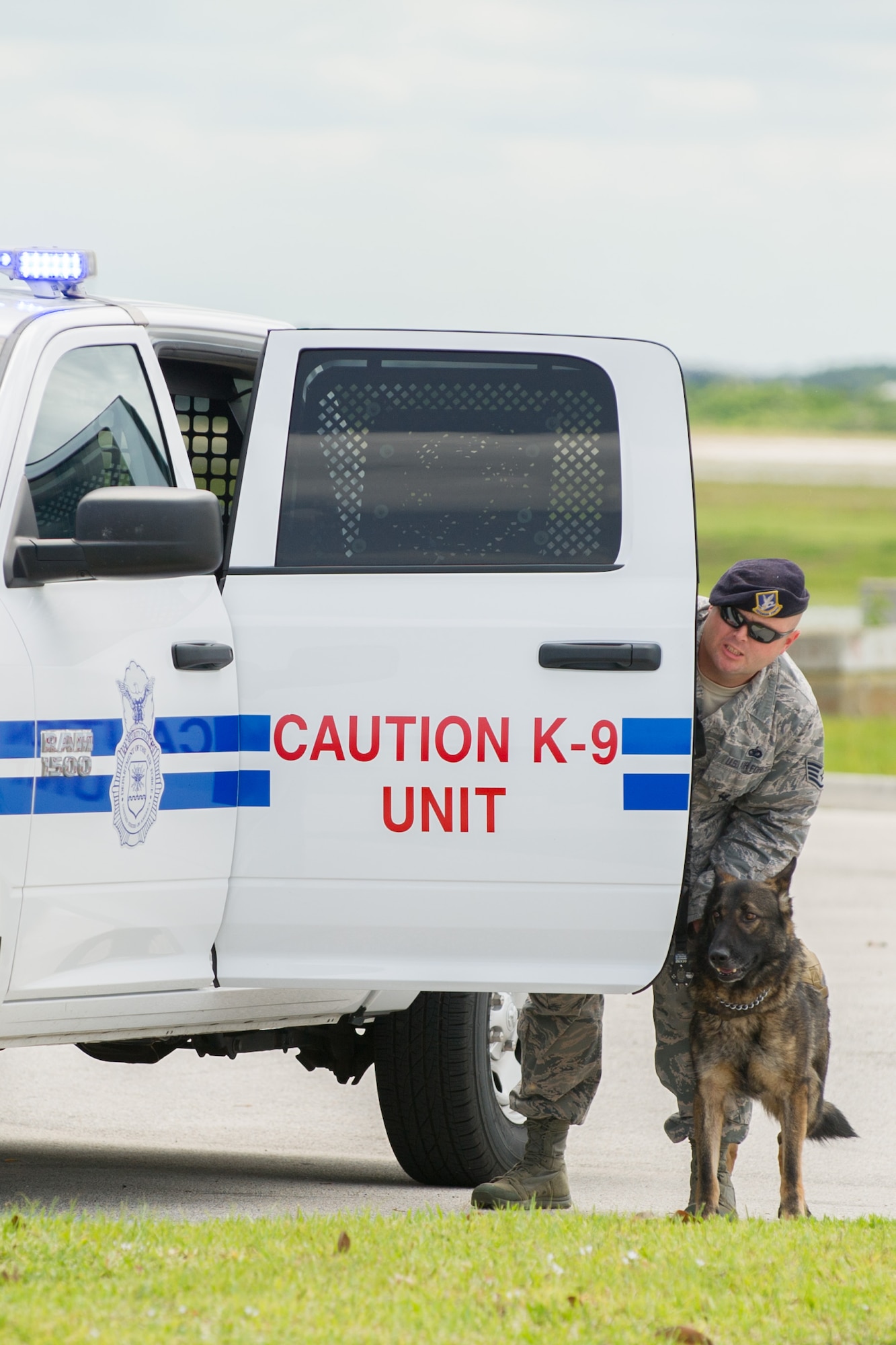 The 45th Security Forces Squadron held an open house at Patrick Air Force Base, Fla., May 18, 2016, during National Police Week, to honor all law enforcement and first responders who have made the ultimate sacrifice. The open house included a Military Working Dog demonstration and a tour of the holding cells, dispatch center, mobile command post, weapons display, and patrol vehicles. This year’s National Police Week dates are May 15-21. (U.S. Air Force photos/Benjamin Thacker/Released)