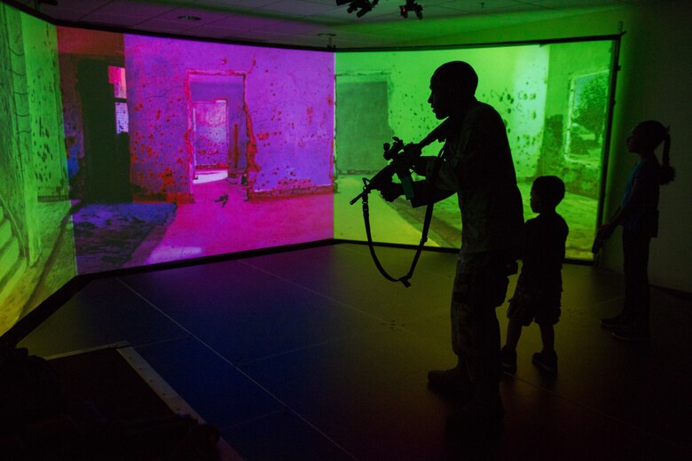 The 45th Security Forces Squadron held an open house at Patrick Air Force Base, Fla., May 18, 2016, during National Police Week, to honor all law enforcement and first responders who have made the ultimate sacrifice. The open house included a Military Working Dog demonstration and a tour of the holding cells, dispatch center, mobile command post, weapons display, and patrol vehicles. This year’s National Police Week dates are May 15-21. (U.S. Air Force photos/Benjamin Thacker/Released)
