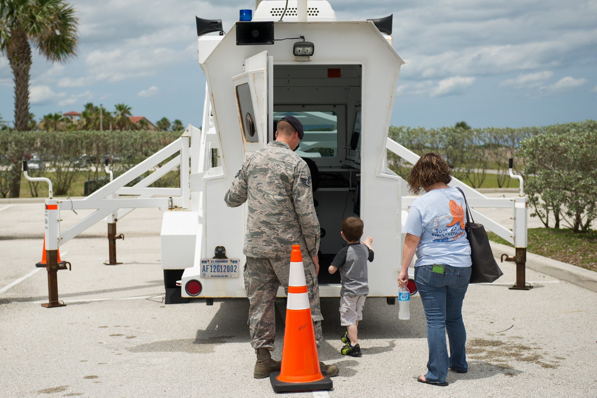 The 45th Security Forces Squadron held an open house at Patrick Air Force Base, Fla., May 18, 2016, during National Police Week, to honor all law enforcement and first responders who have made the ultimate sacrifice. The open house included a Military Working Dog demonstration and a tour of the holding cells, dispatch center, mobile command post, weapons display, and patrol vehicles. This year’s National Police Week dates are May 15-21. (U.S. Air Force photos/Benjamin Thacker/Released)