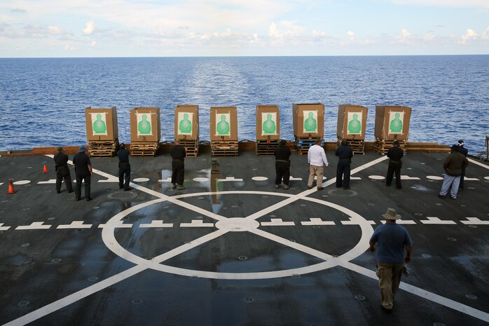 160509-N-IX266-008 SOUTH CHINA SEA—The crew of fleet replenishment oiler USNS John Ericsson (T-AO 194) prepare to conduct a small-arms weapons qualification course here, May 5. (U.S. Navy photo by Grady T. Fontana/Released)