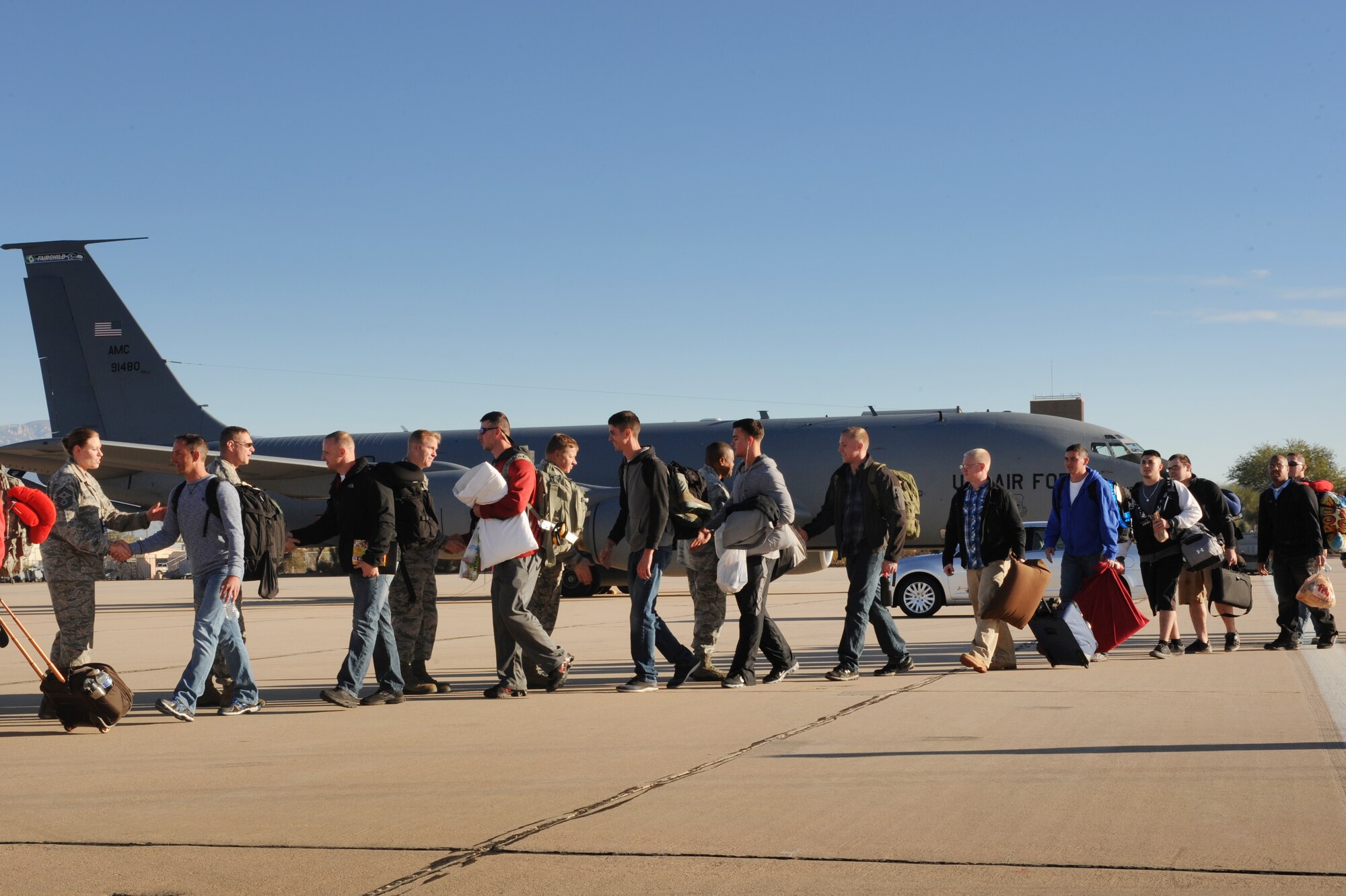 U.S. Air Force Airmen from the 355th Fighter Wing depart for a deployment from Davis-Monthan Air Force Base, Ariz., Feb. 11, 2015. These Airmen were a part of the largest deployment of personnel since WWII to deploy from D-M. (U.S. Air Force photo by Airman 1st Class Cheyenne A. Powers/Released)