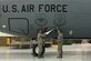 Lt. Col. Duane Richardson, the 22nd Aircraft Maintenance Squadron commander, left, and Chief Master Sgt. Joseph Thomas, the 22nd AMXS superintendent, reveal the dedicated crew chief box on a KC-135 Stratotanker May 2, 2016, at McConnell Air Force Base, Kan. The 22nd AMXS and the 931st Aircraft Maintenance Squadron held a DCC induction ceremony where 58 DCCs and assistant DCCs were assigned to 25 KC-135 Stratotankers. (Courtesy photo)