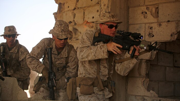 Marines with 1st Battalion, 2nd Marine Regiment, 2nd Marine Division clear a room during a military operations in urban terrain tactics exercise in Al Quweyrah, Jordan, May 16, 2016. Eager Lion is a recurring exercise between partner nations designed to strengthen military-to-military relationships, increase interoperability, and enhance regional security and stability.