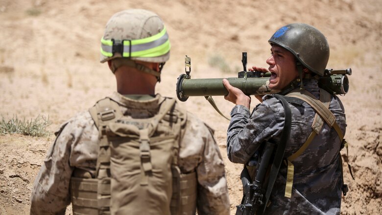 A member of the Jordanian 77th Marines Battalion prepares to fire a training rocket launcher during an explosive weapons range in Al Quweyrah, Jordan, May 16, 2016. Eager Lion is a recurring exercise between partner nations designed to strengthen military-to-military relationships, increase interoperability, and enhance regional security and stability.