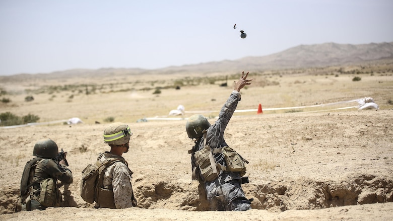 A member of the Jordanian 77th Marines Battalion prepares tosses a training grenade during an explosive weapons range in Al Quweyrah, Jordan, May 16, 2016. Eager Lion is a recurring exercise between partner nations designed to strengthen military-to-military relationships, increase interoperability, and enhance regional security and stability.